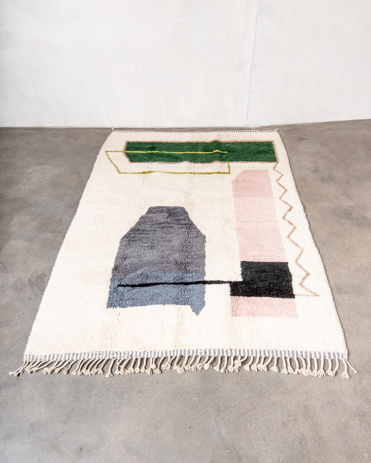 Modern, designer, handcrafted Berber rug from Morocco. Beniourain carpet with beautiful colours and patterns and fluffy wool texture.
